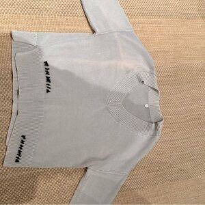 Gray V-Neck Sweater with Black Accents